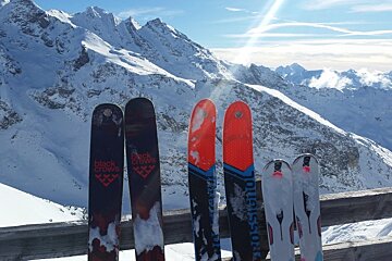 three sets of skis