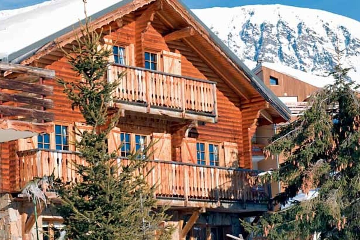 a picture of an alpine chalet in Alpe d'Huez