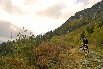 mountain biker in the autumnal colours of chamonix