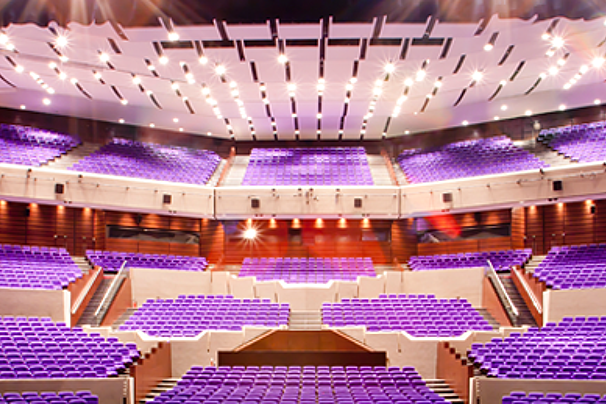 The interior of the theatre with purple seats