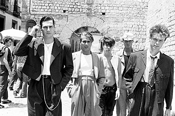 an old black & white photo of a pop band