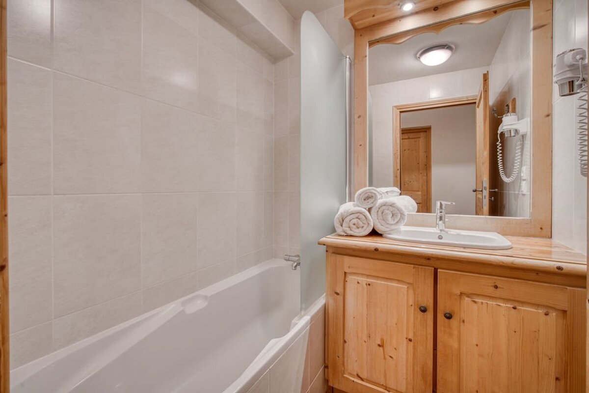 A bathroom with a sink and a bathtub