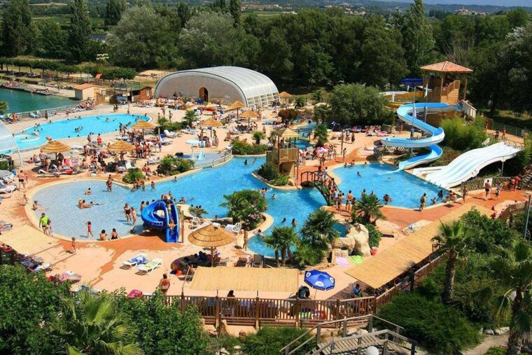 an aerial view of swimming pools & slides at the aqua parc