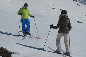 instructor and pupil off piste