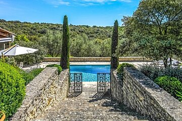 a path leading to a swimming pool