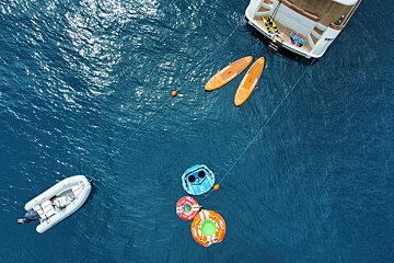 An aerial view of a boat in the ocean