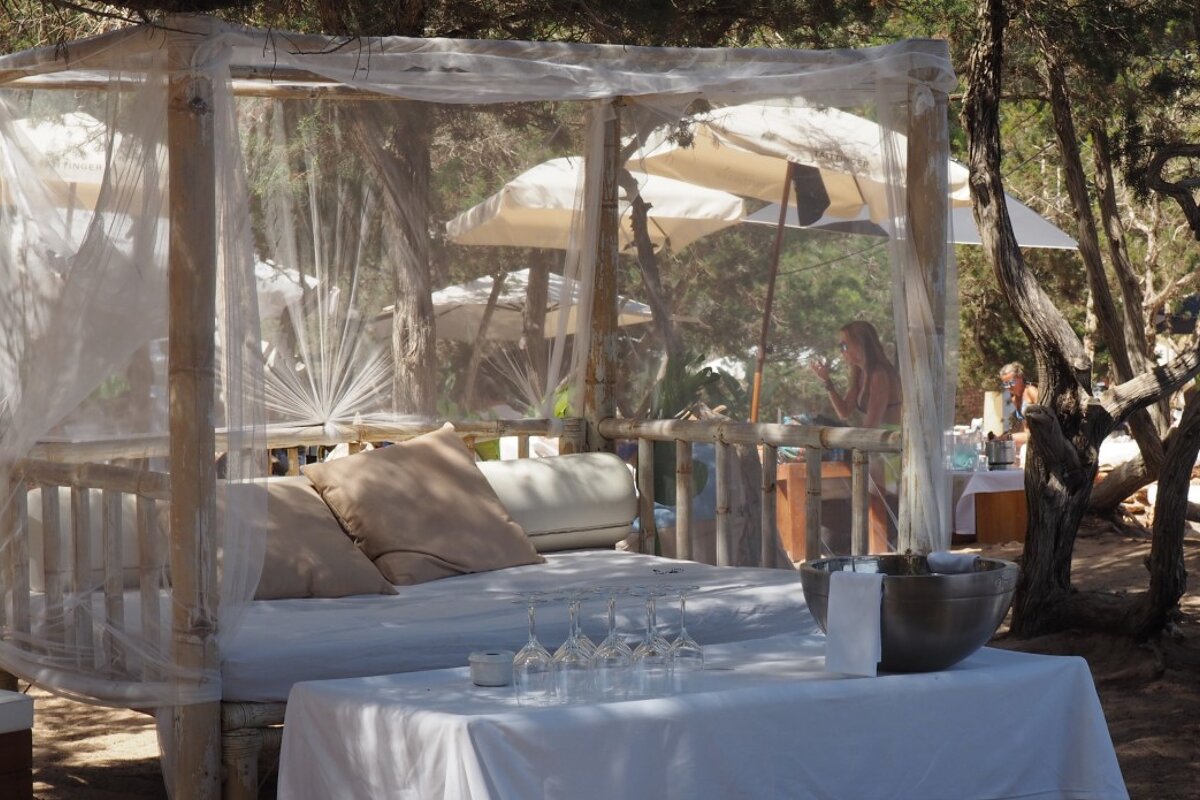 A cabana bed at Cala Bassa Beach Club in Ibiza