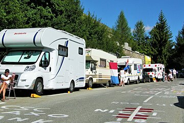 Fans camp on the road side for days