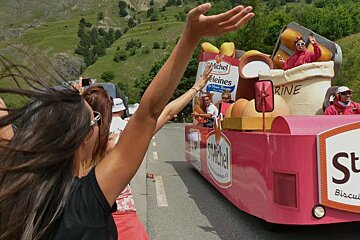 The caravan...sponsors give out freebies ahead of the race