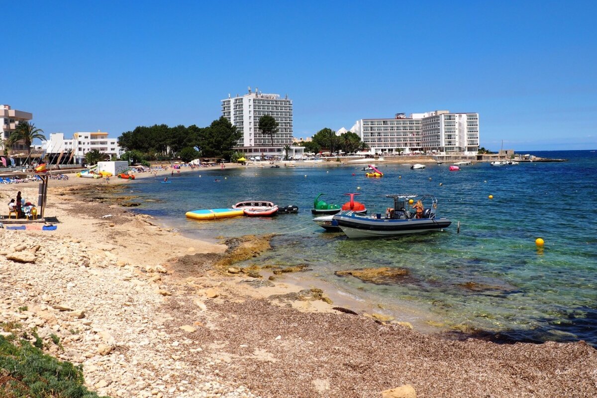 a beach view at the end of san antonion bay ibiza