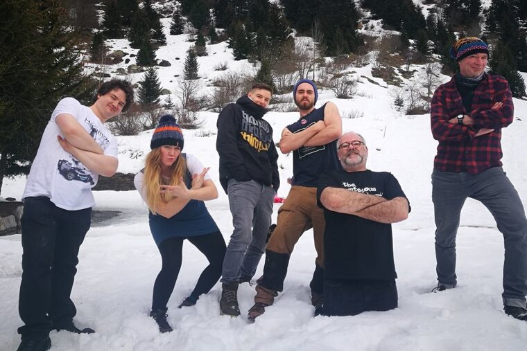 a band stood in the snow