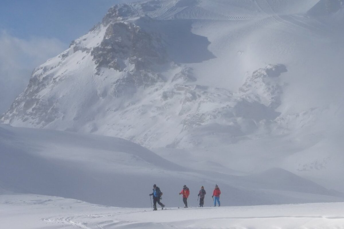 skiers in the mist