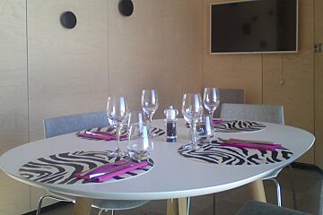 a table with zebra print mats