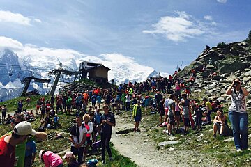 spectators with mont blanc in background chamonix