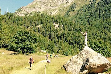 runners in the mountains near buet, chamonix