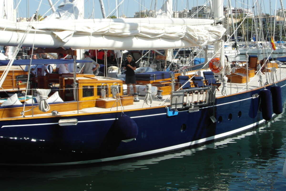 a dark blue yacht in Palma