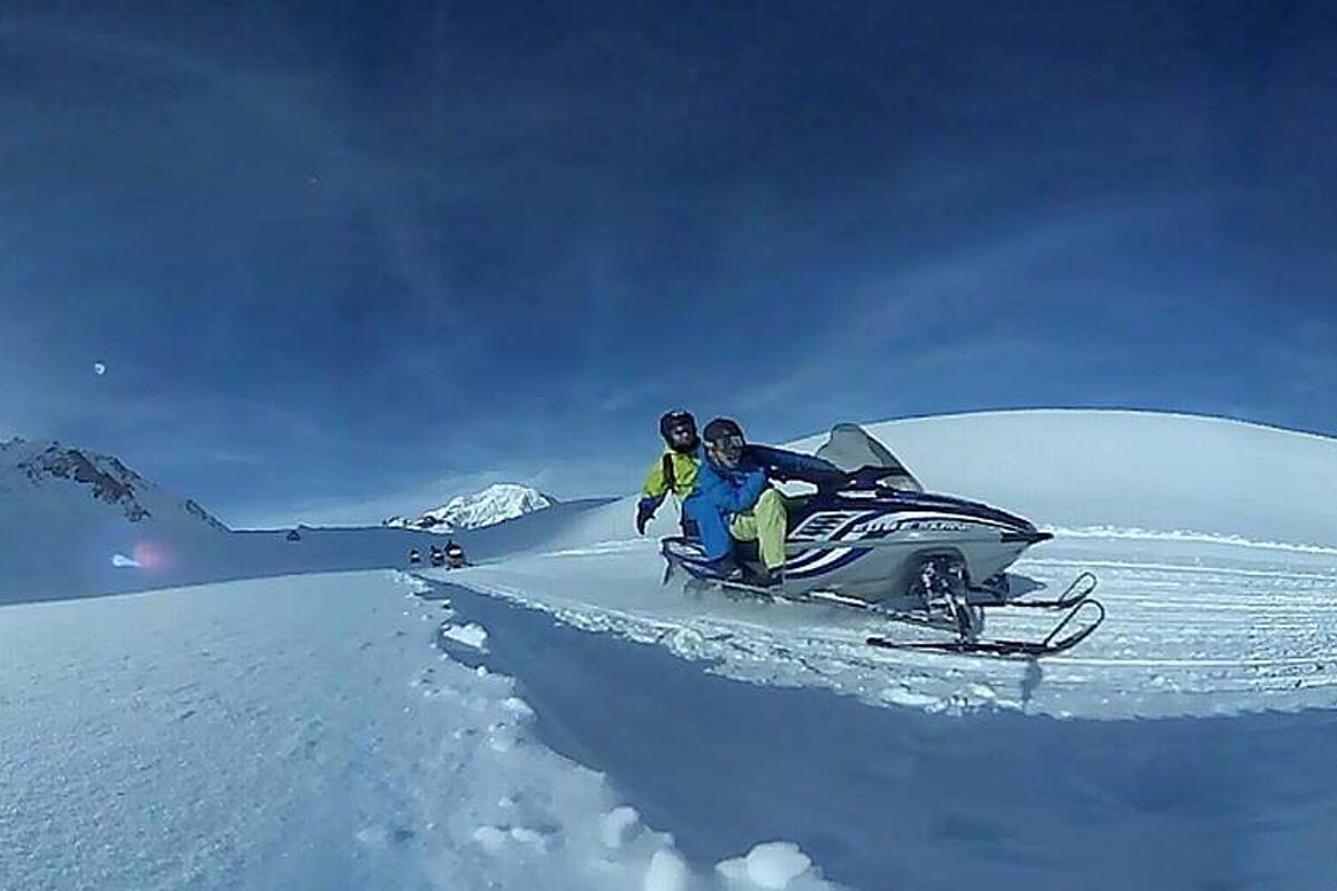 two people on a skidoo