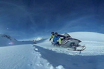 two people on a skidoo