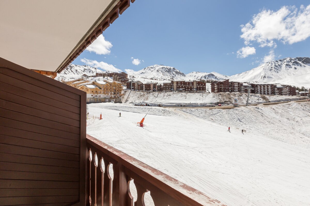 A view of a ski resort from a balcony