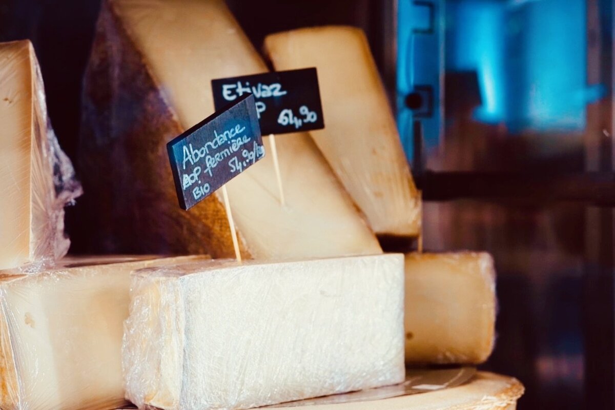 Several pieces of cheese are stacked on top of each other