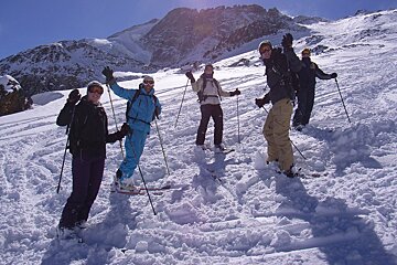 a ski instructor giving a group lesson
