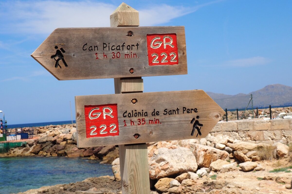 a walking trail marker sign