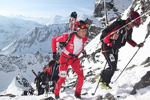 ski racers going up hill