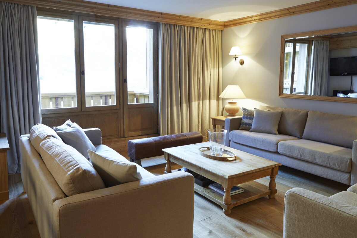 A living room with two couches and a coffee table