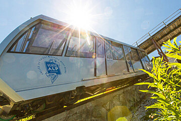 a funicular cabin going up a track