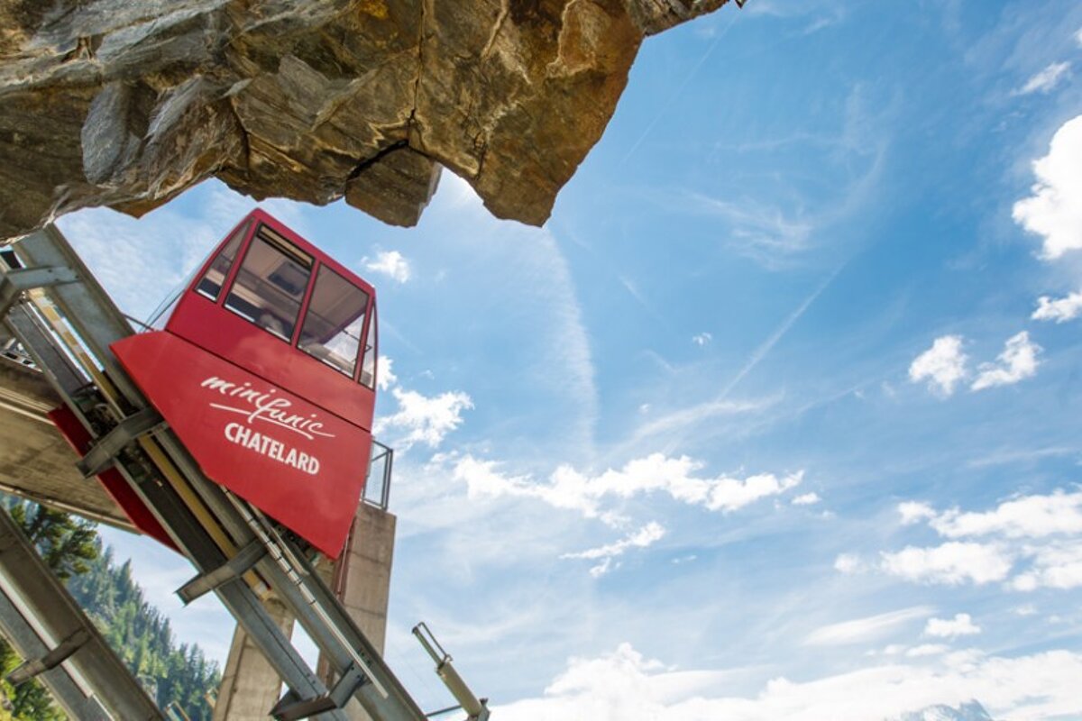a small funicular cabin on a steep track