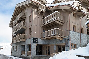 A building with a sign that says c on it