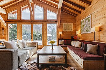 A living room with a couch and a coffee table