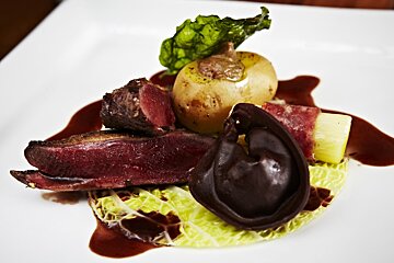 a white plate of food in a chalet