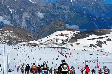 mountain bikers on snow