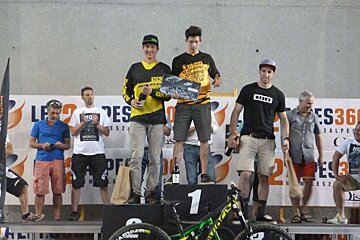 mountain bikers on a podium