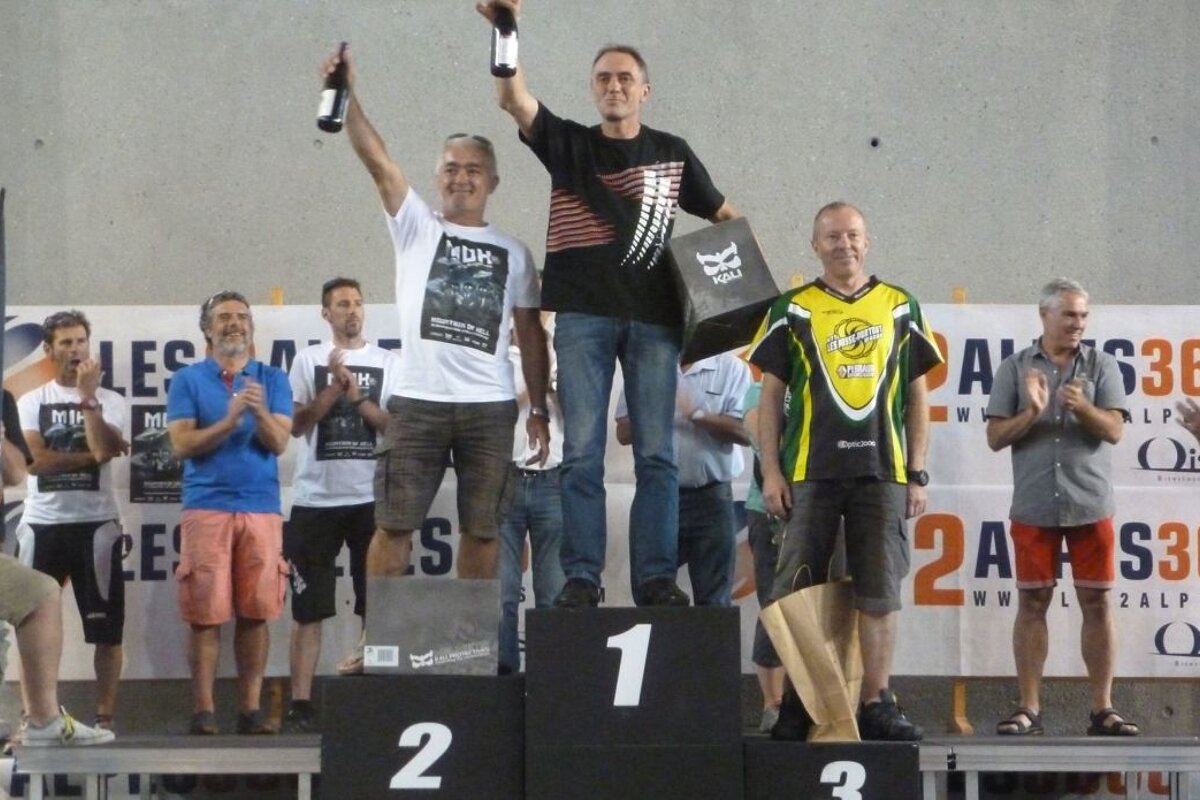 mountain bikers on a podium