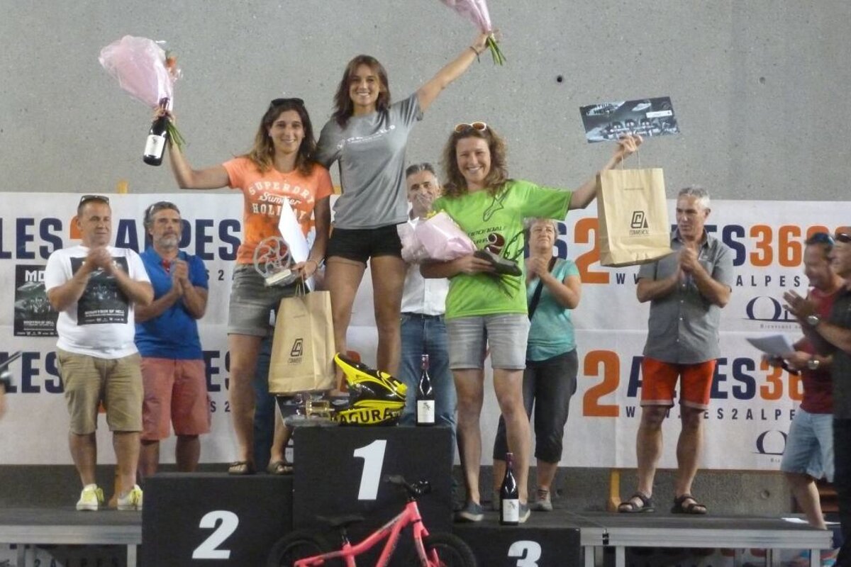 mountain bikers on a podium