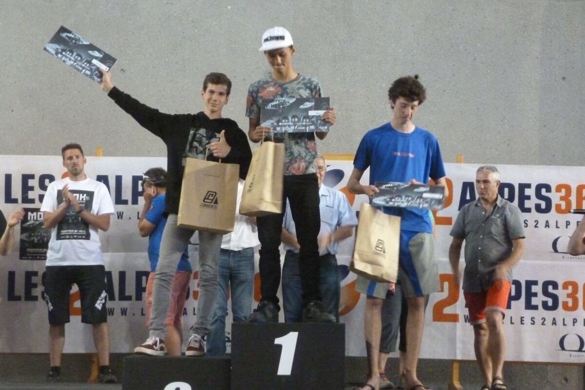mountain bikers on a podium