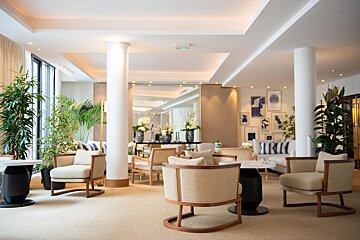 A large room with a lot of chairs and tables