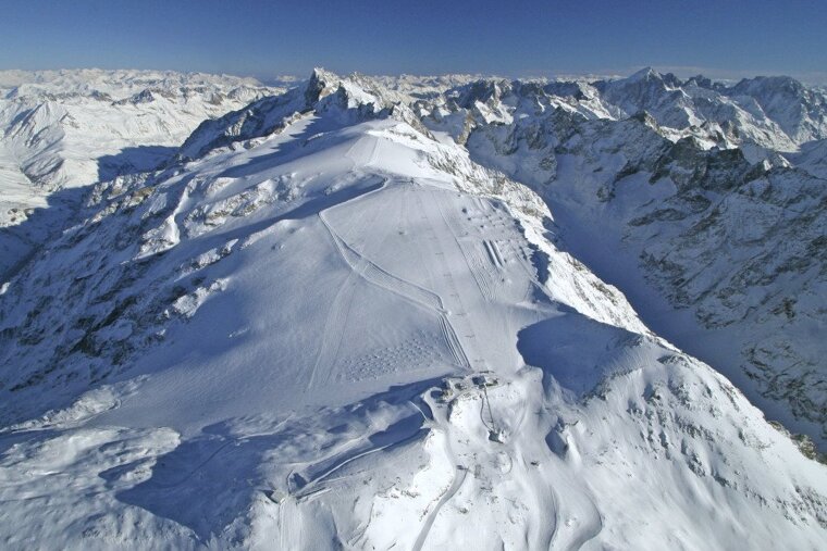 a mountain with lifts on