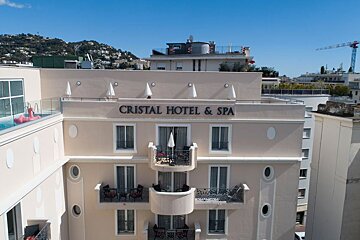 The exterior of a hotel called cristal hotel & spa