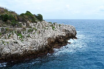 stone steps cut into rocks by the sea