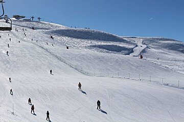 a piste with a chair lift in Val disere
