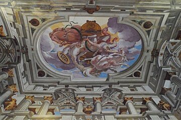 a highly decorated ceiling in the museum