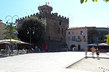 a large fortress style building in a town in Nice