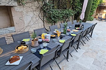 A long table with a bunch of food on it