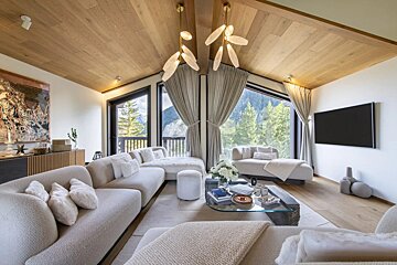 A living room filled with furniture and a flat screen tv