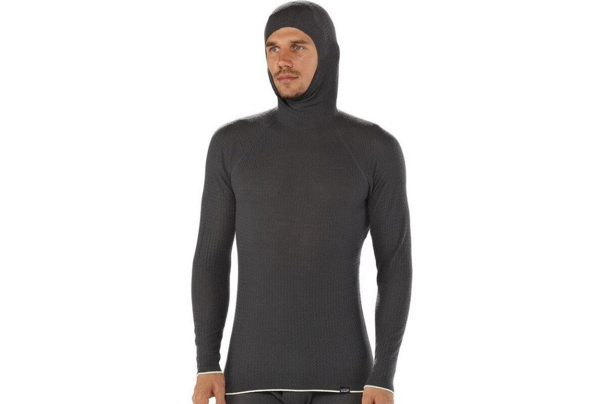 a man wearing a wool hooded top