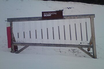 a children's xylophone on the side of the piste
