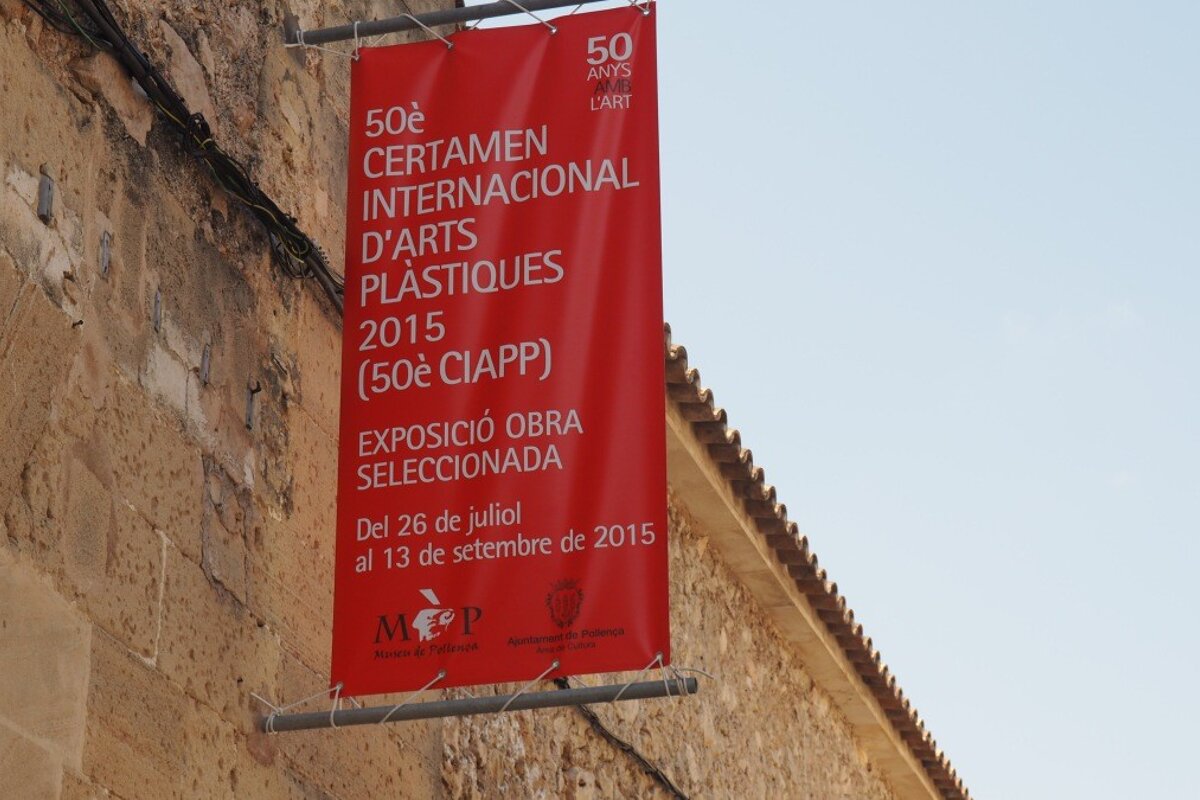 a sign outside a museum in pollenca